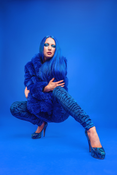 Best model in Glasgow poses for clothing line in a studio for top Scotland commercial photographer in fashion photo shoot - Photography by Nate Cleary