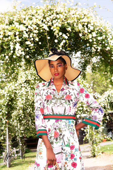 Top Glasgow model poses for clothing line in a garden for best Scotland commercial photographer at fashion photoshoot - Photography by Nate Cleary