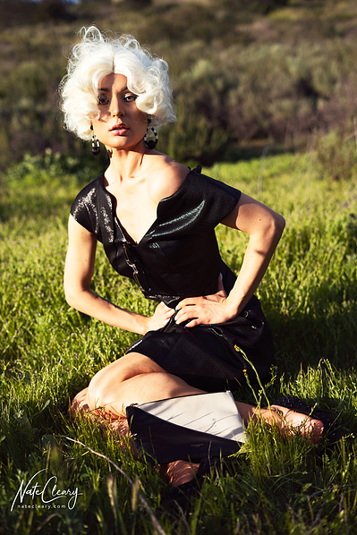Best Glasgow model poses for creative clothing brand in a field for Scotland top fashion photographer at commercial photoshoot - Photography by Nate Cleary
