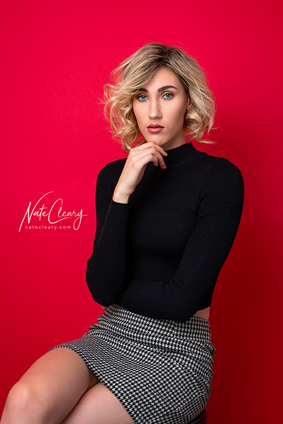 Top model in Glasgow poses for clothing line outdoors for best Scotland fashion photographer in commercial photo shoot - Photography by Nate Cleary