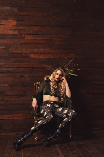 Top Scotland model poses for clothing line in a studio for best Glasgow commercial photographer at fashion photoshoot - Photography by Nate Cleary