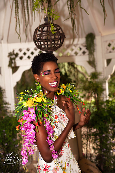 Top Glasgow model poses for clothing line in a garden for best Scotland commercial photographer at fashion photoshoot - Photography by Nate Cleary
