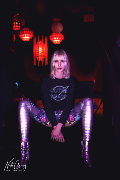 Best agency model in Glasgow poses for creative leggings brand in studio for top Scotland fashion photographer in commercial photoshoot - Photography by Nate Cleary