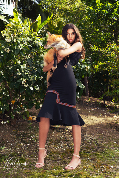Top Scotland model poses for clothing line with a fox for best Glasgow fashion photographer at commercial photoshoot - Photography by Nate Cleary