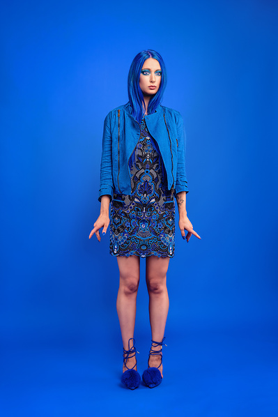 Best model in Glasgow poses for clothing line in a studio for top Scotland commercial photographer in fashion photo shoot - Photography by Nate Cleary