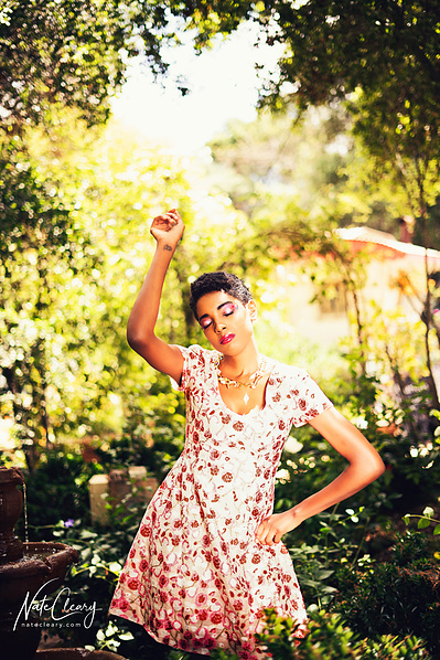 Top Glasgow model poses for clothing line in a garden for best Scotland commercial photographer at fashion photoshoot - Photography by Nate Cleary