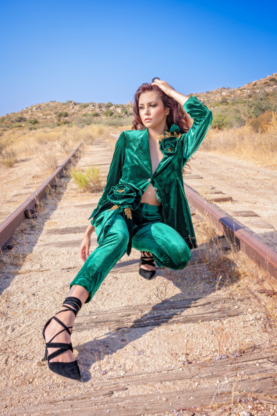Top agency model in Scotland poses for clothing line in desert for best Glasgow commercial photographer in fashion photo shoot - Photography by Nate Cleary