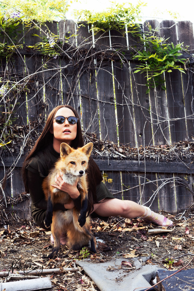 Top Scotland model poses for clothing line with a fox for best Glasgow fashion photographer at commercial photoshoot - Photography by Nate Cleary