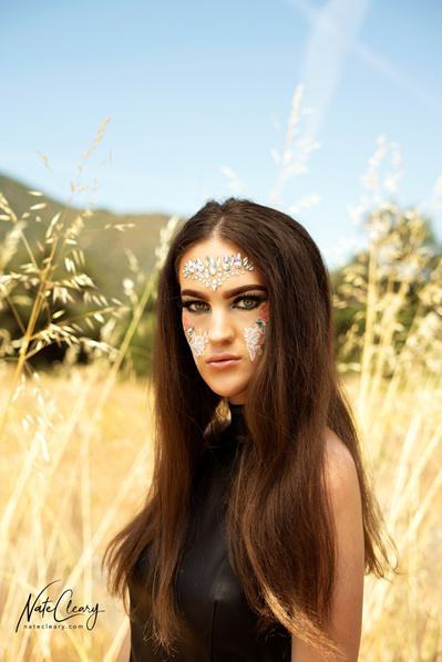 Best Scotland model poses for creative clothing brand in a field for Glasgow top fashion photographer at commercial photoshoot - Photography by Nate Cleary