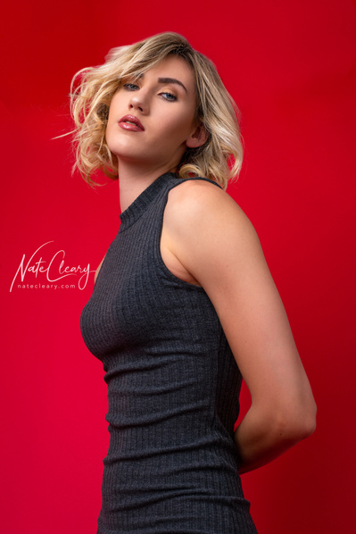 Top model in Glasgow poses for clothing line outdoors for best Scotland fashion photographer in commercial photo shoot - Photography by Nate Cleary