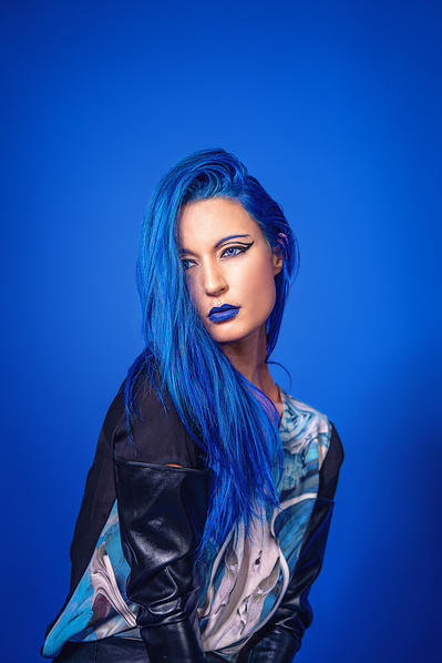 Best model in Glasgow poses for clothing line in a studio for top Scotland commercial photographer in fashion photo shoot - Photography by Nate Cleary