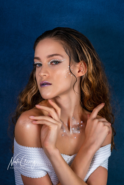 Best model in Glasgow poses for creative clothing brand in studio for top fashion photographer in Scotland at commercial photoshoot - Photography by Nate Cleary
