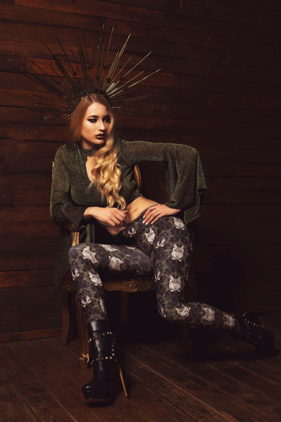 Top Scotland model poses for clothing line in a studio for best Glasgow commercial photographer at fashion photoshoot - Photography by Nate Cleary