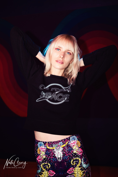 Best agency model in Glasgow poses for creative leggings brand in studio for top Scotland fashion photographer in commercial photoshoot - Photography by Nate Cleary