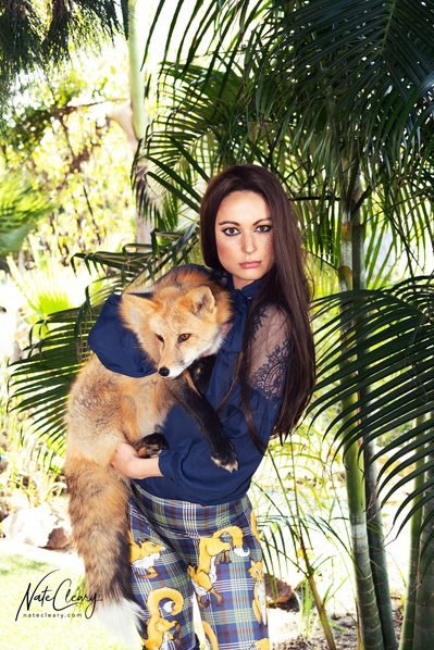 Top Scotland model poses for clothing line with a fox for best Glasgow fashion photographer at commercial photoshoot - Photography by Nate Cleary