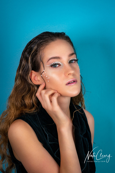 Best model in Glasgow poses for creative clothing brand in studio for top fashion photographer in Scotland at commercial photoshoot - Photography by Nate Cleary
