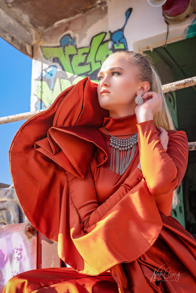 Top agency model in Glasgow poses for clothing line in desert for best Scotland commercial photographer in fashion photo shoot - Photography by Nate Cleary