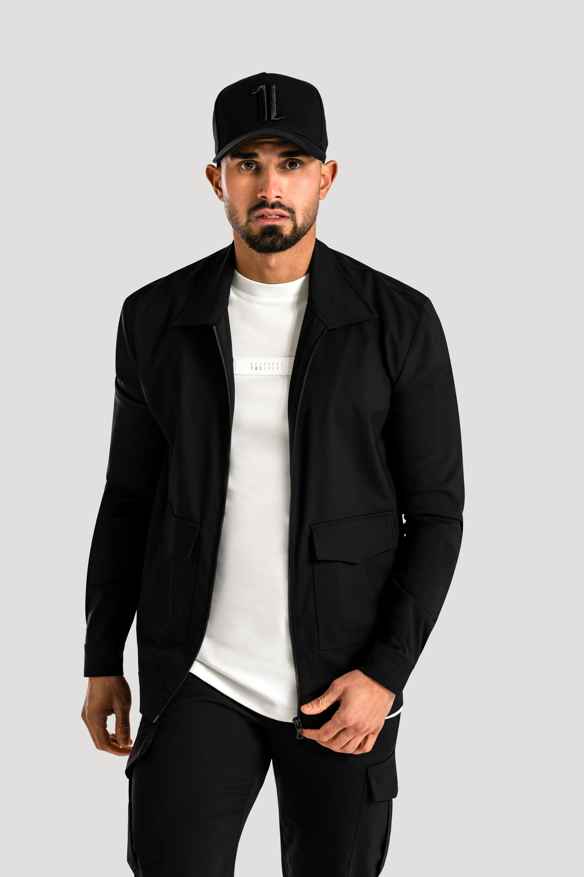 Man poses in commercial fashion photoshoot while wearing clothing in Glasgow for Royle 11 Designs
