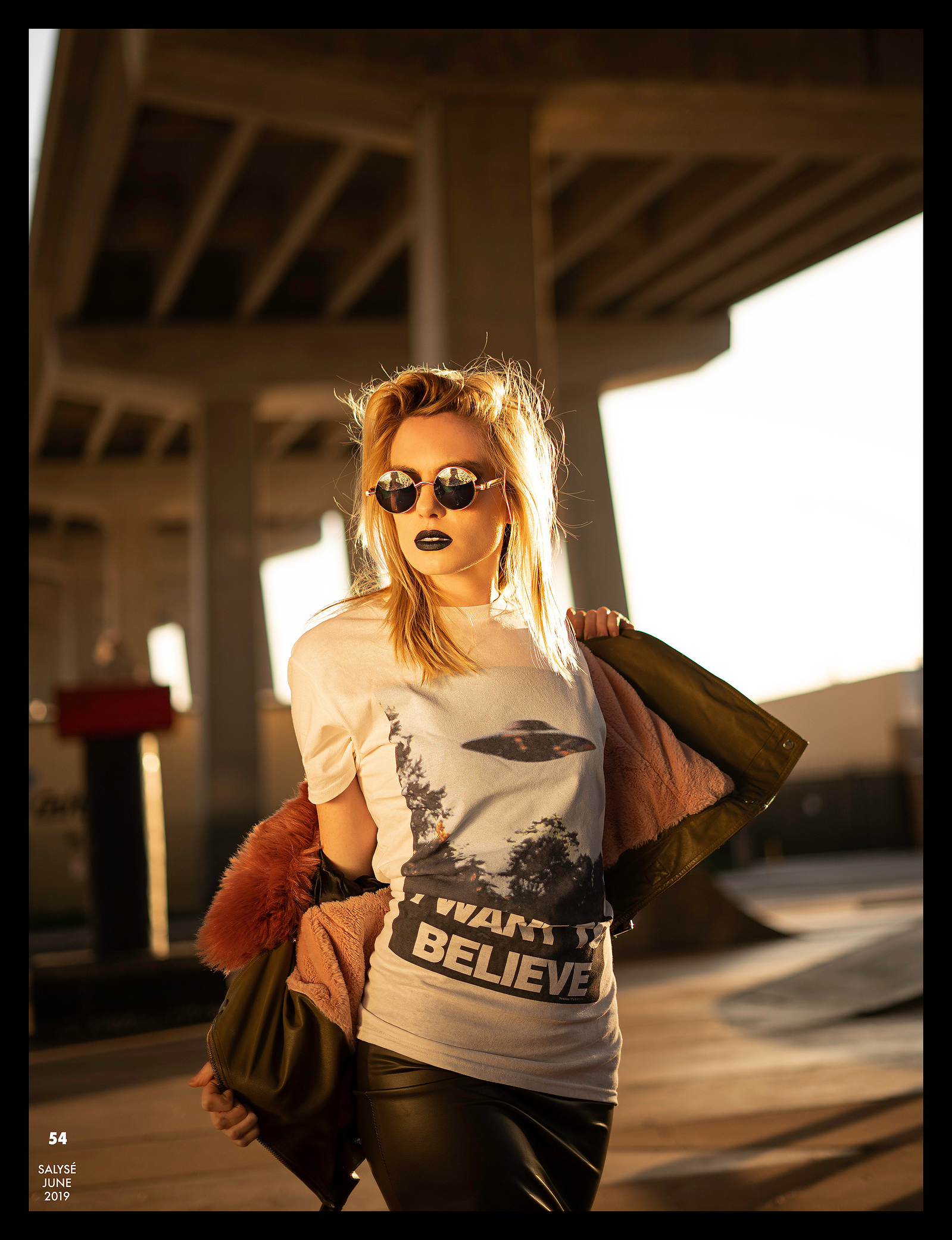 Top model in Glasgow poses outside for best Scotland commercial fashion photographer for clothing line in magazine photo shoot - Photography by Nate Cleary
