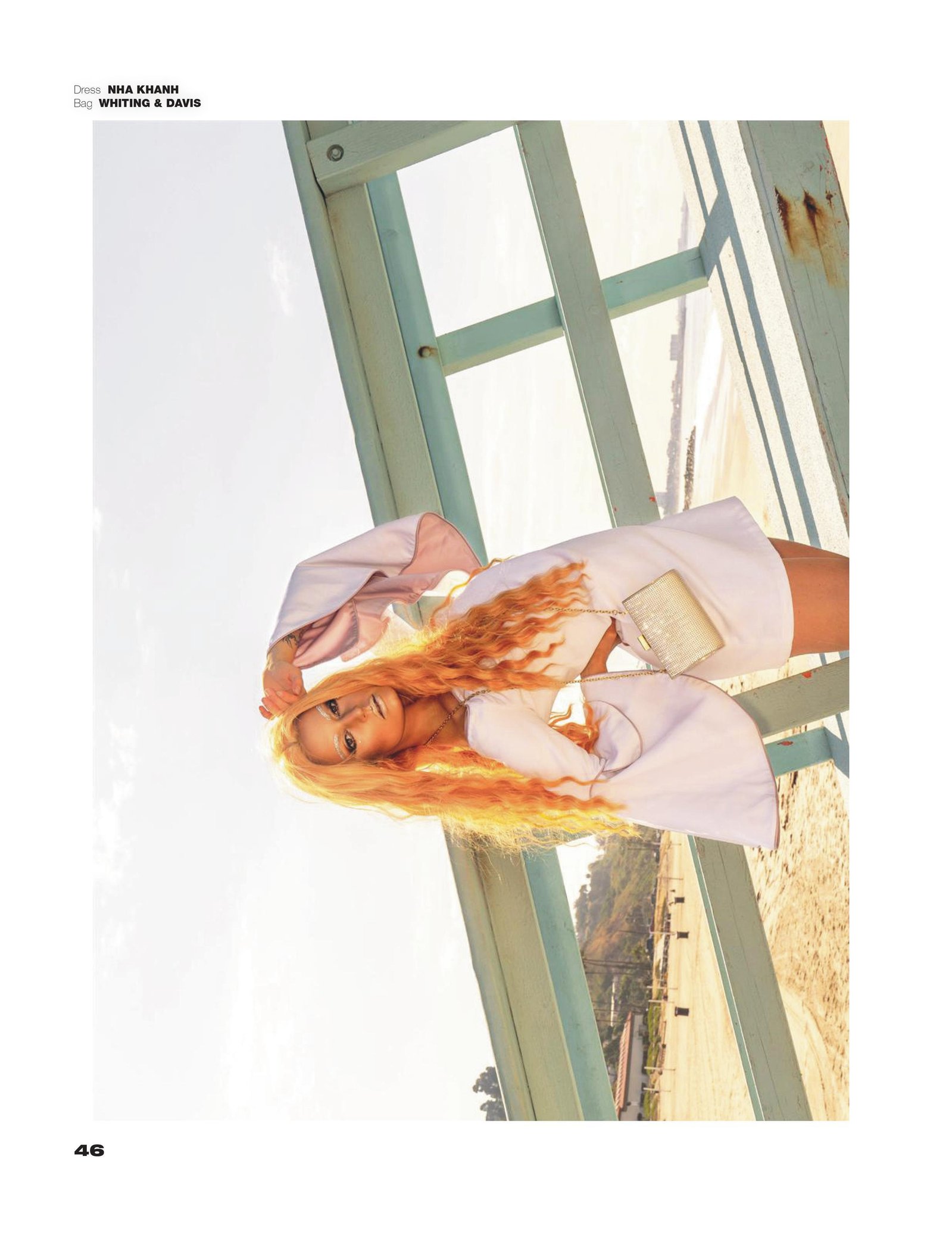 Top model in Glasgow poses by sea for best Scotland commercial fashion photographer for clothing line in magazine photo shoot - Photography by Nate Cleary