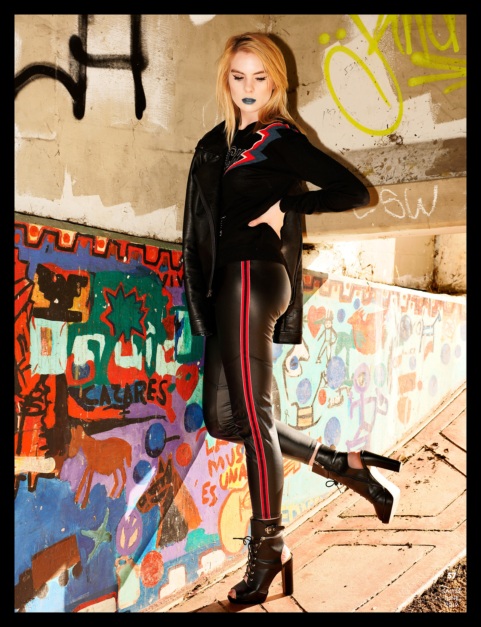 Top model in Glasgow poses outside for best Scotland commercial fashion photographer for clothing line in magazine photo shoot - Photography by Nate Cleary