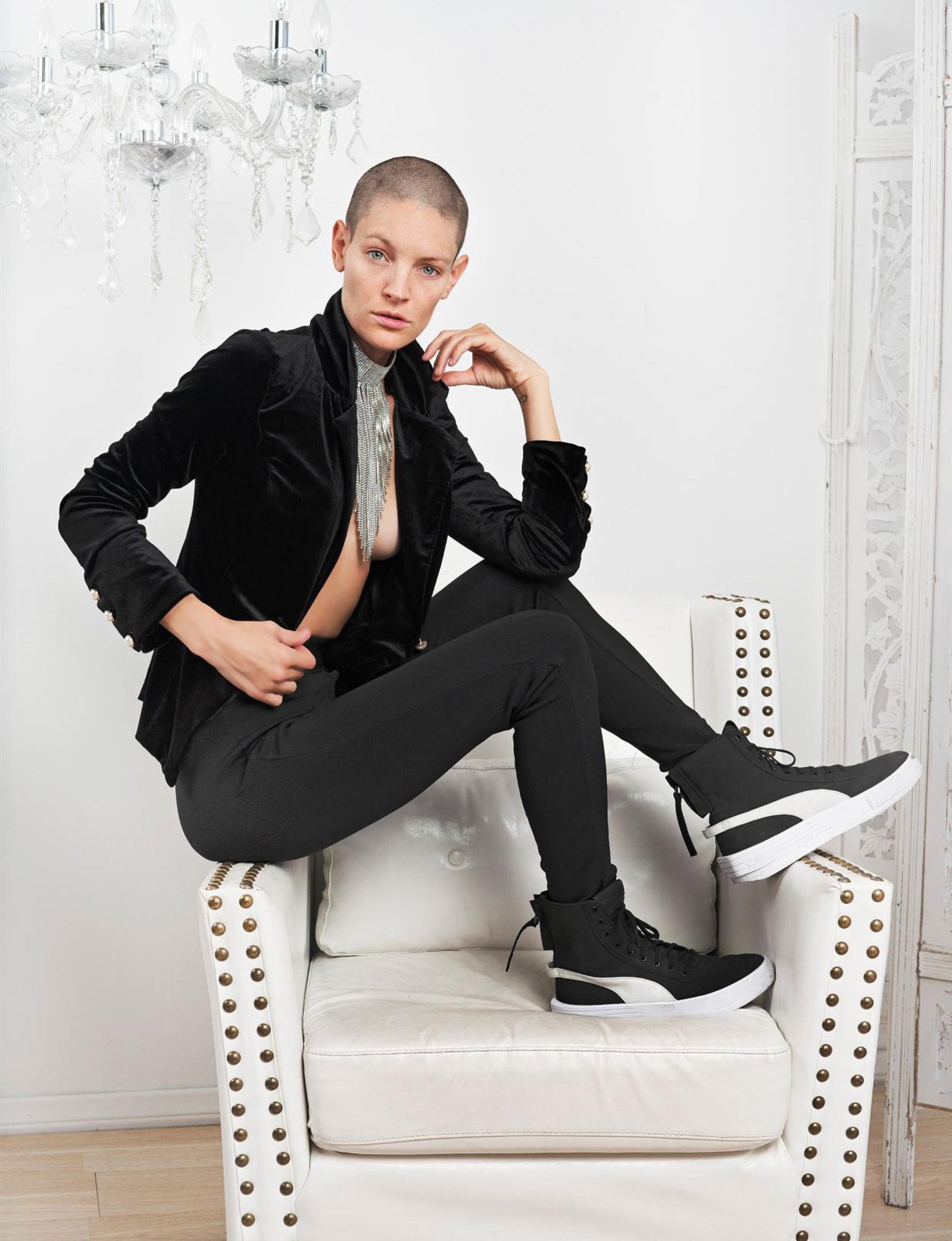 Top agency model in Scotland poses in studio for best Glasgow commercial fashion photographer for clothing line in magazine photo shoot - Photography by Nate Cleary