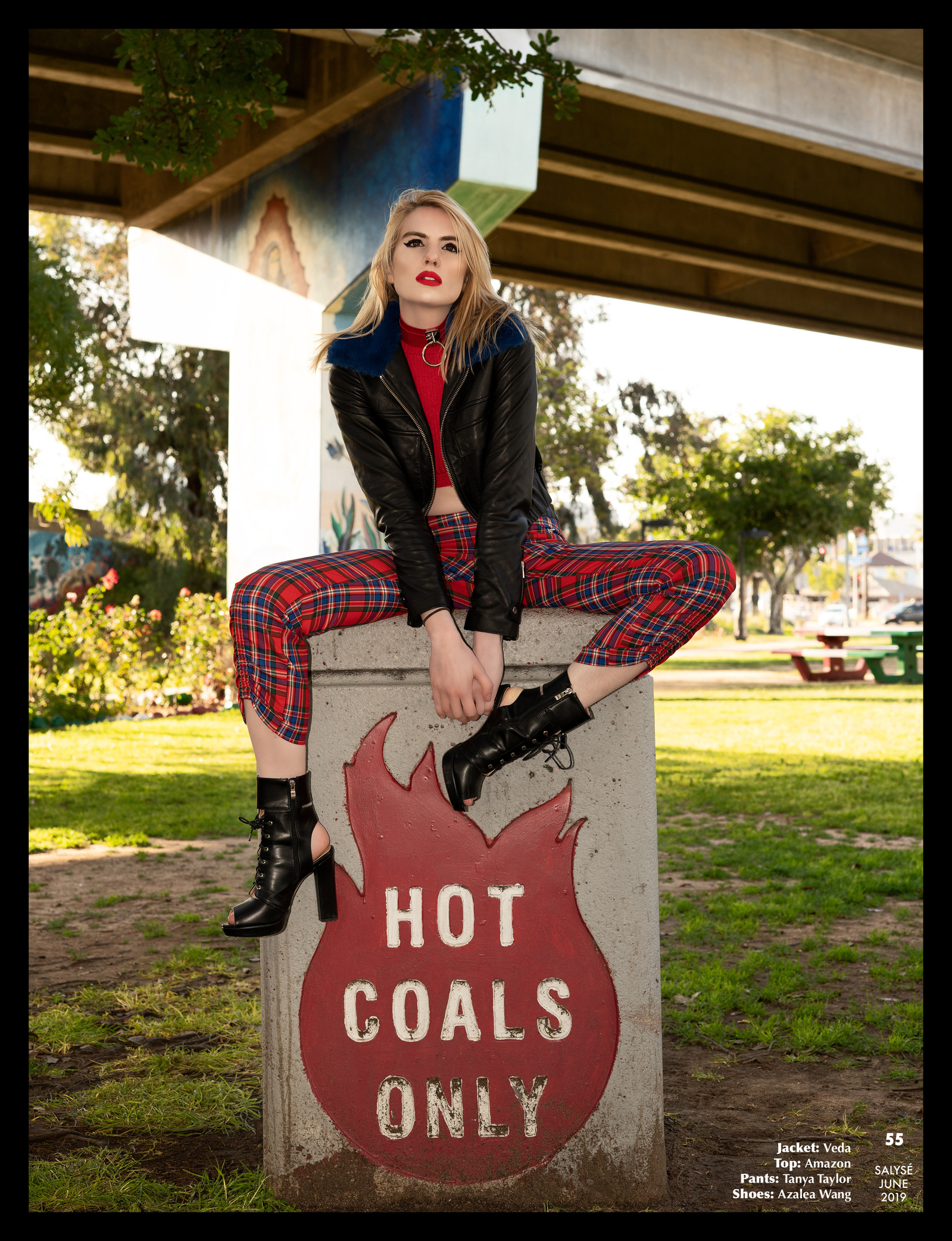 Top model in Glasgow poses outside for best Scotland commercial fashion photographer for clothing line in magazine photo shoot - Photography by Nate Cleary