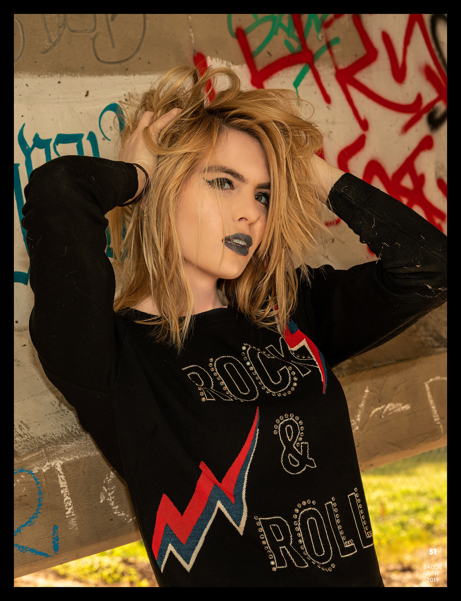 Top model in Glasgow poses outside for best Scotland commercial fashion photographer for clothing line in magazine photo shoot - Photography by Nate Cleary