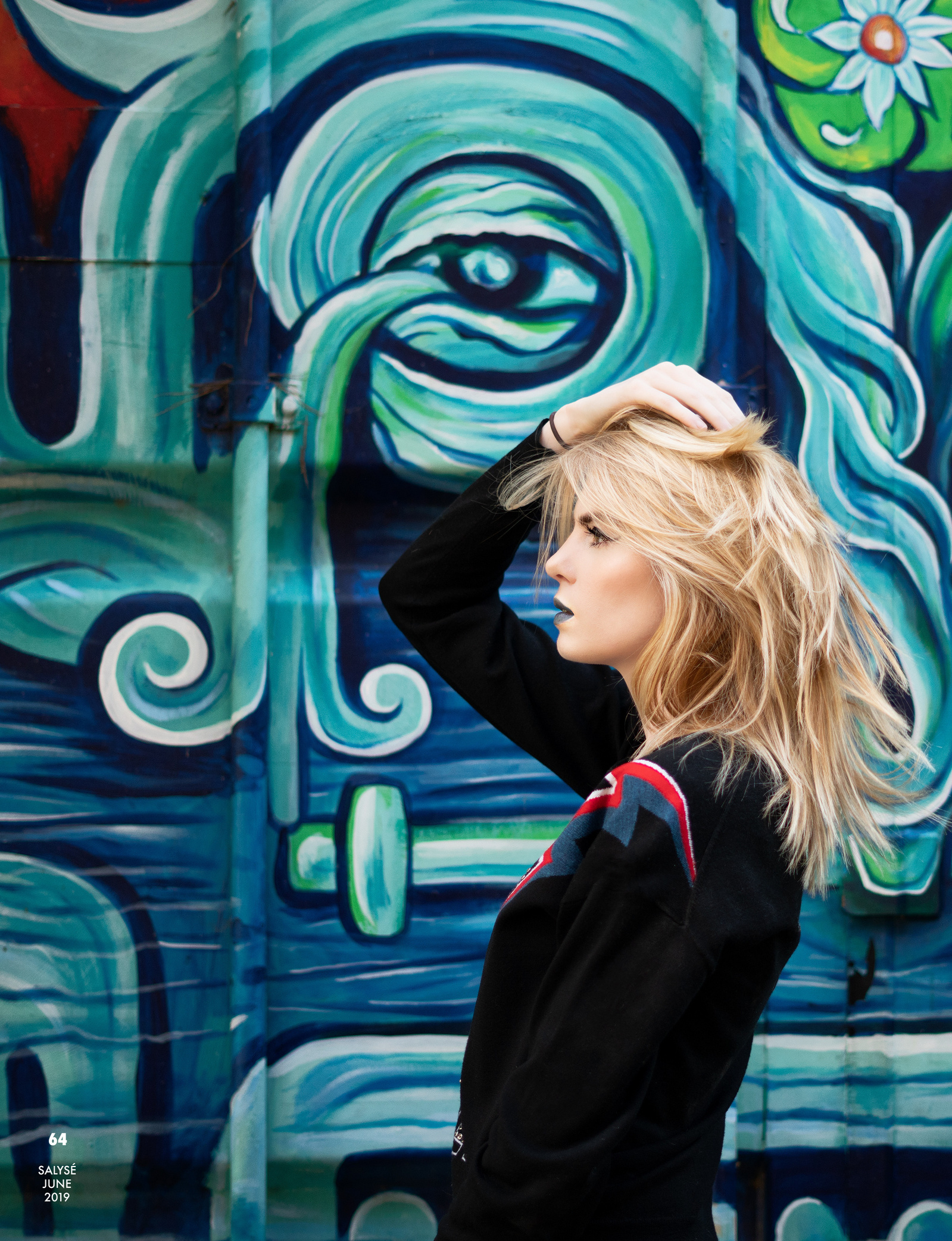Top model in Glasgow poses outside for best Scotland commercial fashion photographer for clothing line in magazine photo shoot - Photography by Nate Cleary