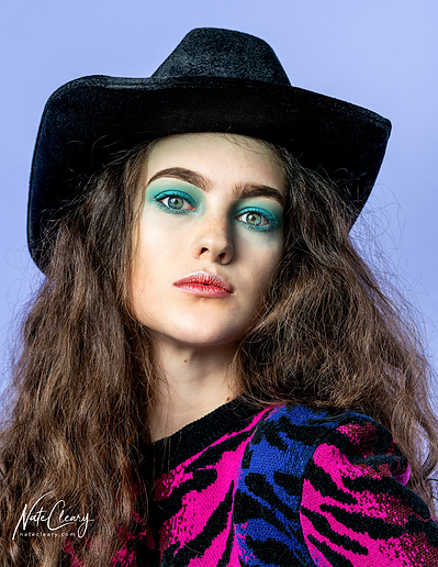 Top Glasgow agency model poses for clothing line in a studio for best Scotland commercial photographer at fashion photoshoot - Photography by Nate Cleary