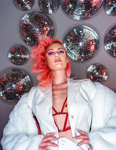 Top model in Glasgow poses for clothing line in studio for best Scotland fashion photographer in commercial photo shoot - Photography by Nate Cleary