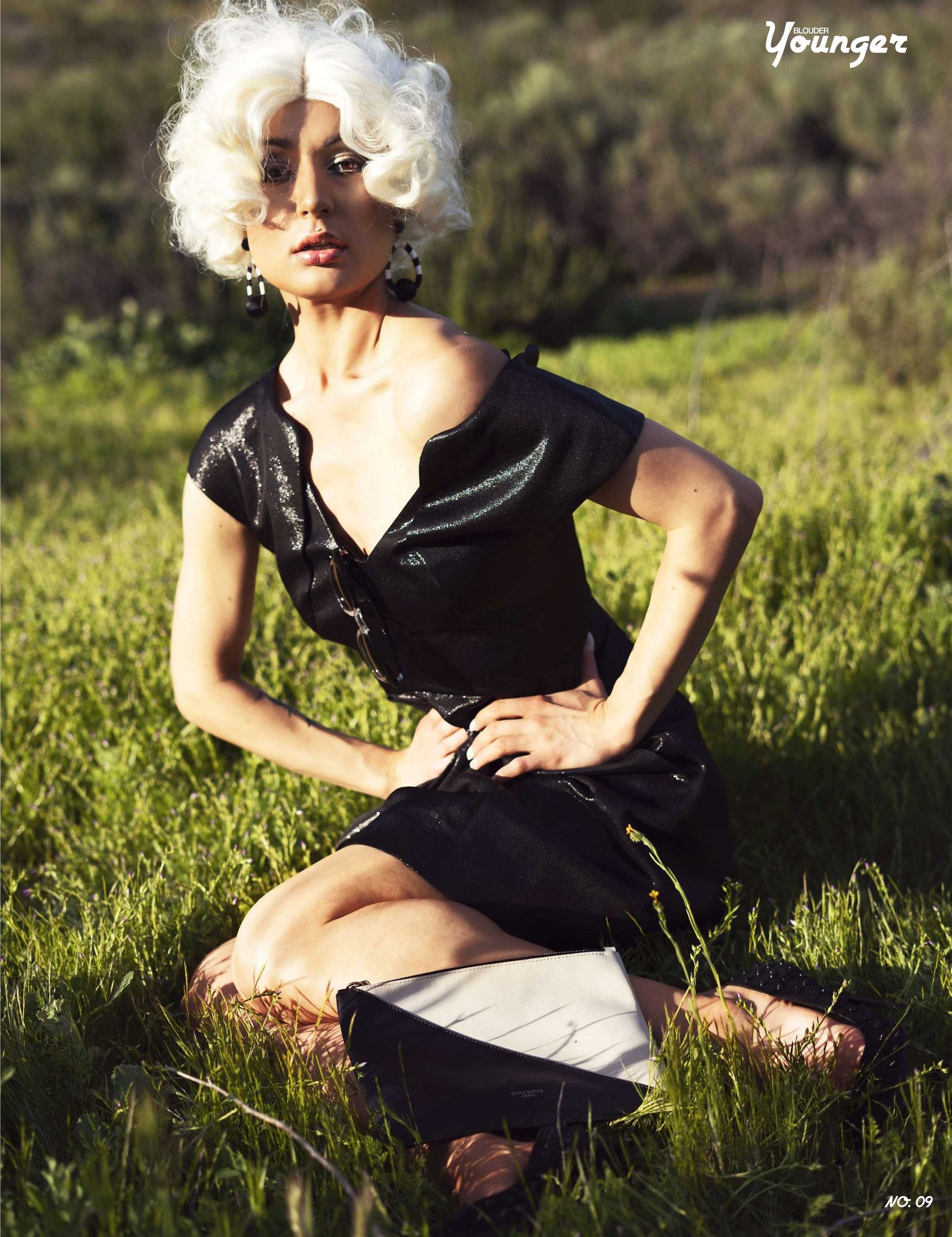 Best model in Scotland poses in a field for top Glasgow commercial fashion photographer for clothing line in magazine photo shoot - Photography by Nate Cleary