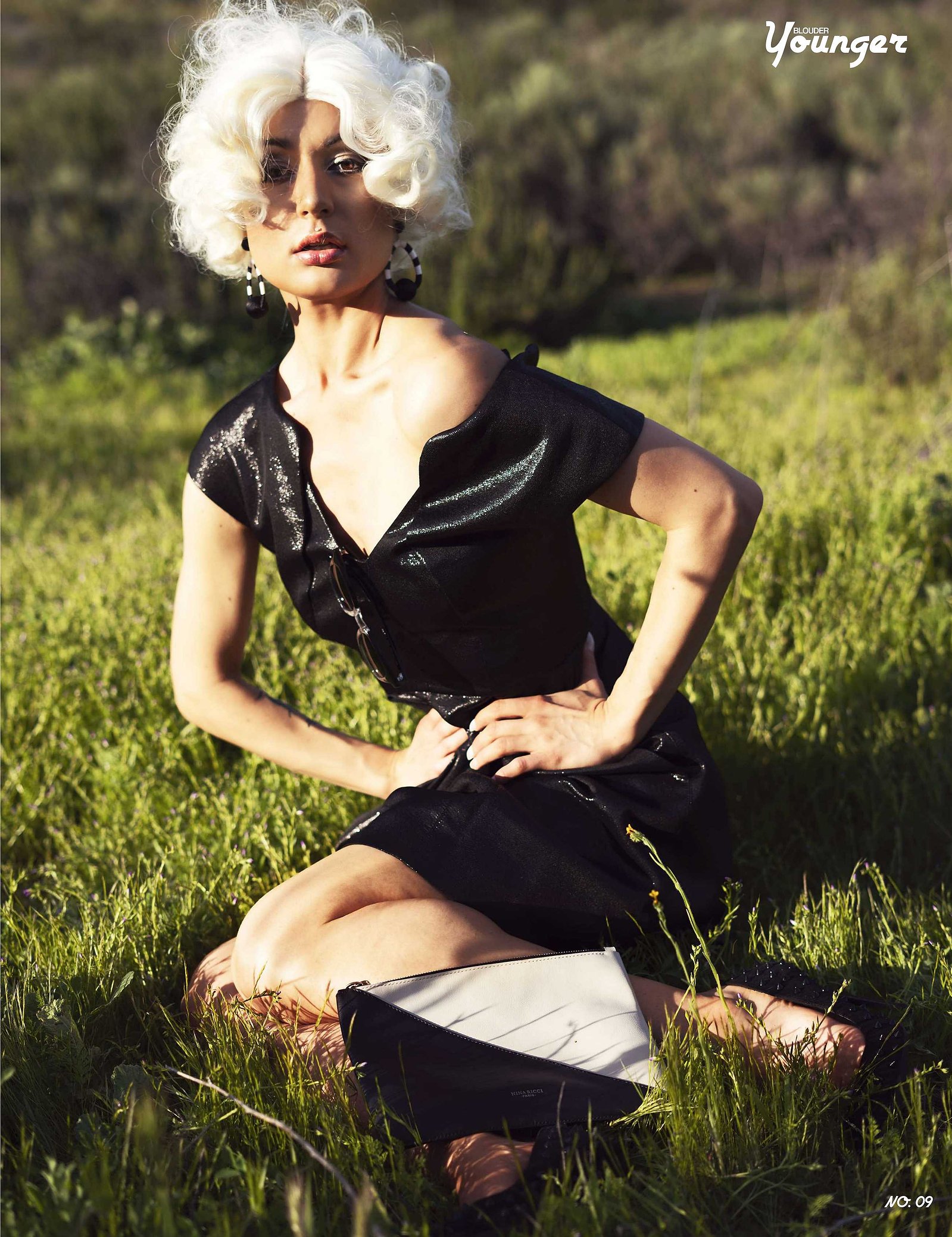 Best model in Scotland poses in a field for top Glasgow commercial fashion photographer for clothing line in magazine photo shoot - Photography by Nate Cleary