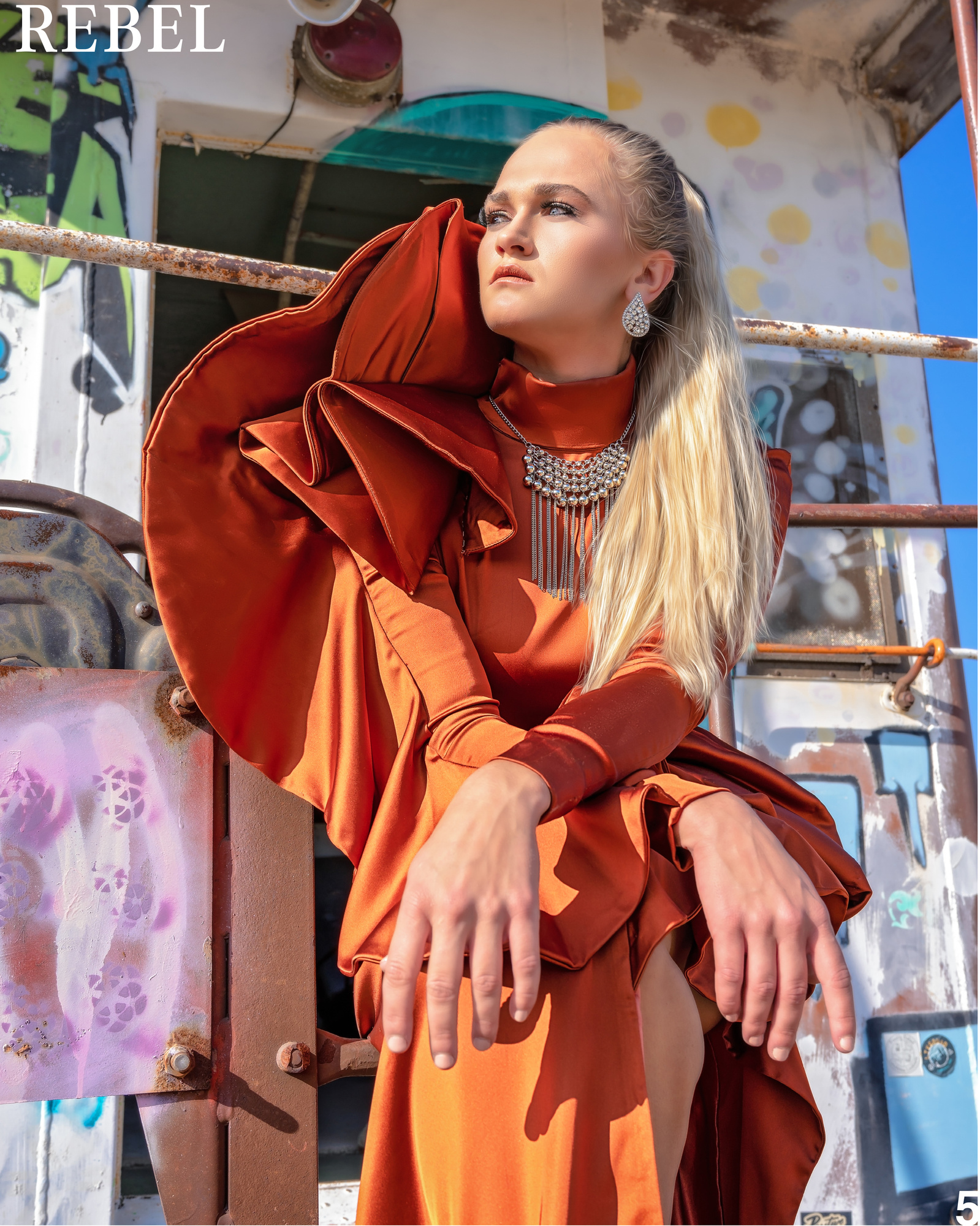 Top model in Scotland poses outside for best Glasgow commercial fashion photographer for clothing line in magazine photo shoot - Photography by Nate Cleary
