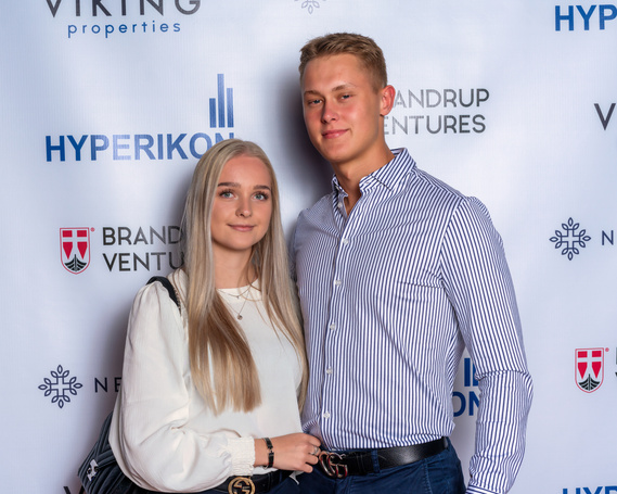 Guests posing for red carpet images at private corporate event- Photography by Nate Cleary