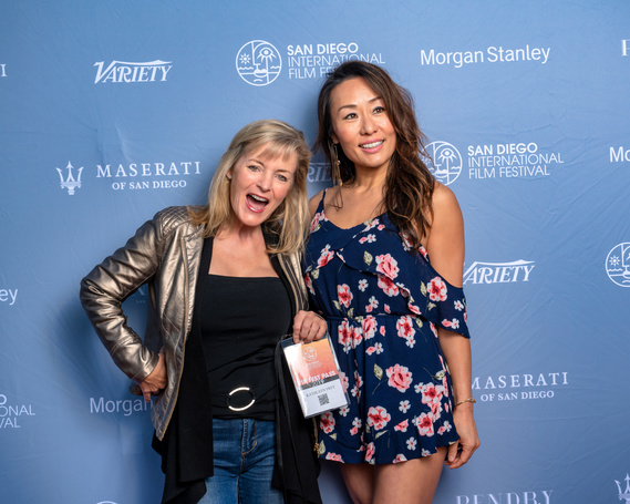 Guests posing at red carpet for International Film Festival- Photography by Nate Cleary