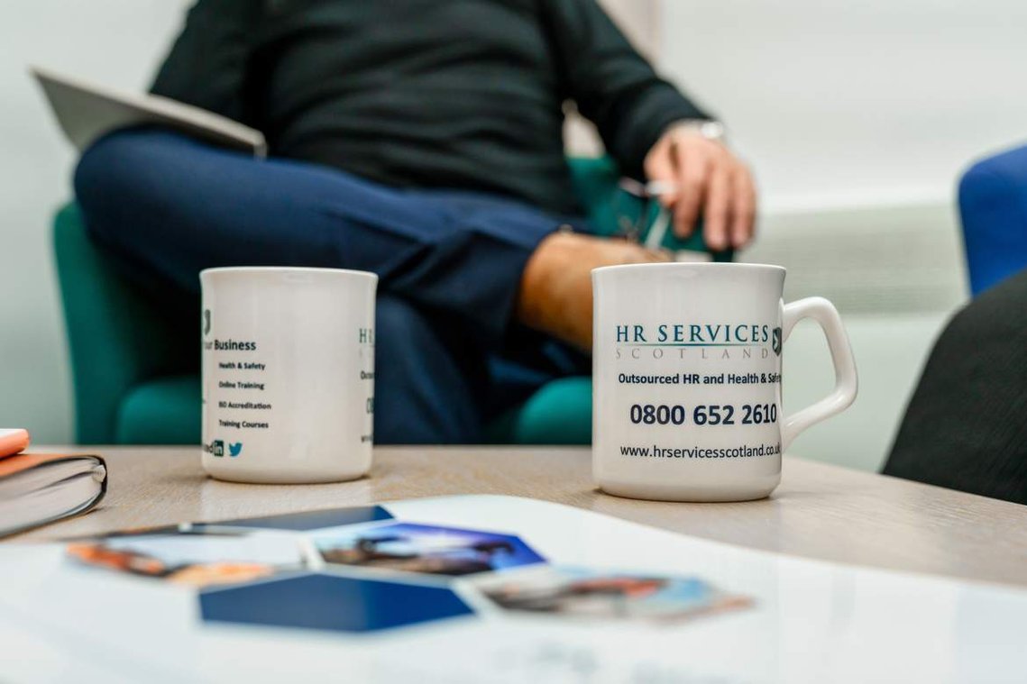 Glasgow Commercial Photography of office meeting for HR Services Scotland - Photography by Nate Cleary