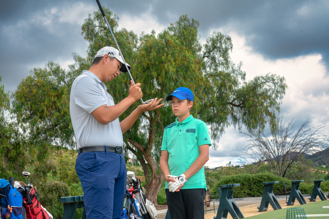 Scotland Commercial Golf Photography of golf instructor teaching student for PGA Golf Academy - Photography by Nate Cleary