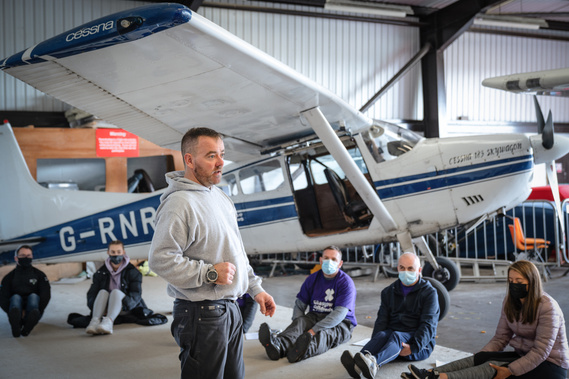 Instructor teaches skydiving techniques for Glasgow Childrens hospital charity event- Photography by Nate Cleary