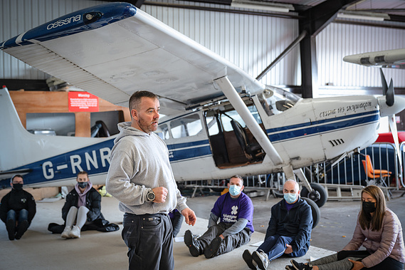 Instructor teaches skydiving techniques for Glasgow Childrens hospital charity event- Photography by Nate Cleary