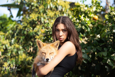 Top Scotland model poses for clothing line with a fox for best Glasgow fashion photographer at commercial photoshoot - Photography by Nate Cleary