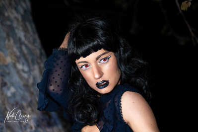 Best Glasgow model poses for creative clothing brand in a field for Scotland top fashion photographer at commercial photoshoot - Photography by Nate Cleary