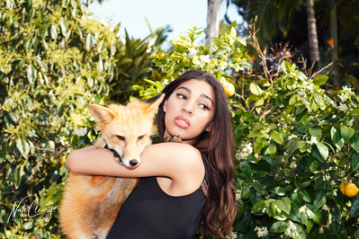 Top Scotland model poses for clothing line with a fox for best Glasgow fashion photographer at commercial photoshoot - Photography by Nate Cleary