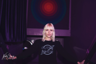 Best agency model in Glasgow poses for creative leggings brand in studio for top Scotland fashion photographer in commercial photoshoot - Photography by Nate Cleary