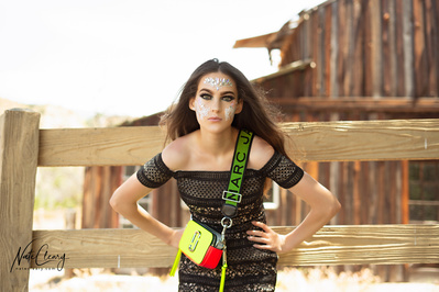 Best Scotland model poses for creative clothing brand in a field for Glasgow top fashion photographer at commercial photoshoot - Photography by Nate Cleary
