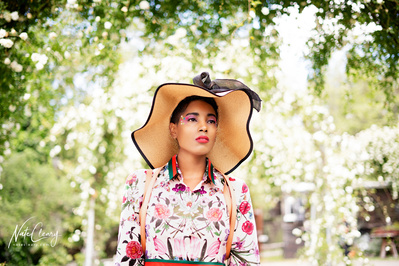 Top Glasgow model poses for clothing line in a garden for best Scotland commercial photographer at fashion photoshoot - Photography by Nate Cleary