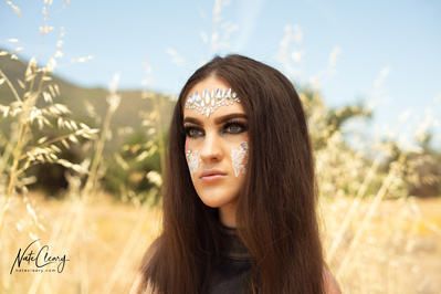 Best Scotland model poses for creative clothing brand in a field for Glasgow top fashion photographer at commercial photoshoot - Photography by Nate Cleary