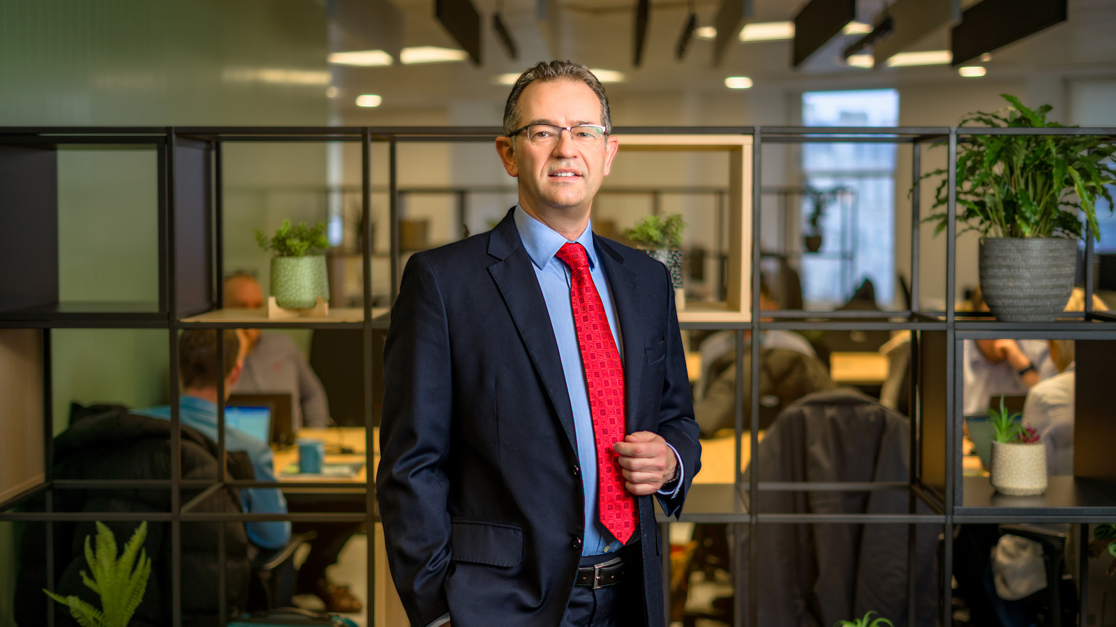Scotland client posing for headshots from Mercer Marsh Benefits at George Square - Photography by Nate Cleary