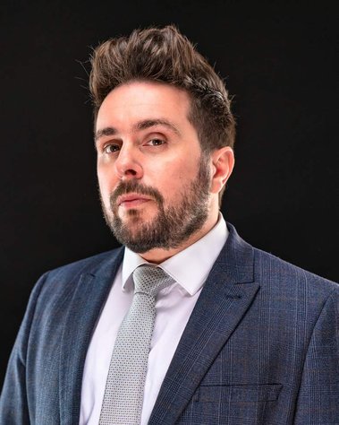 Glasgow client posing for Corporate studio headshot session - Photography by Nate Cleary