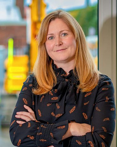 Scotland client posing for corporate headshots from Scot JCB - Photography by Nate Cleary